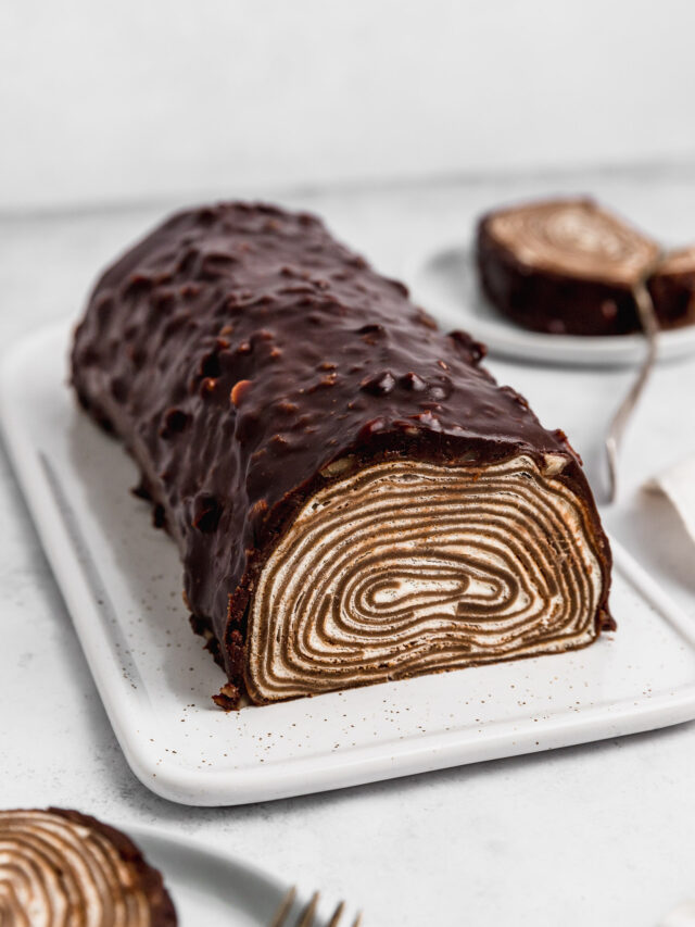 Chocolate Crepe Roll Cake Covered in Ganache